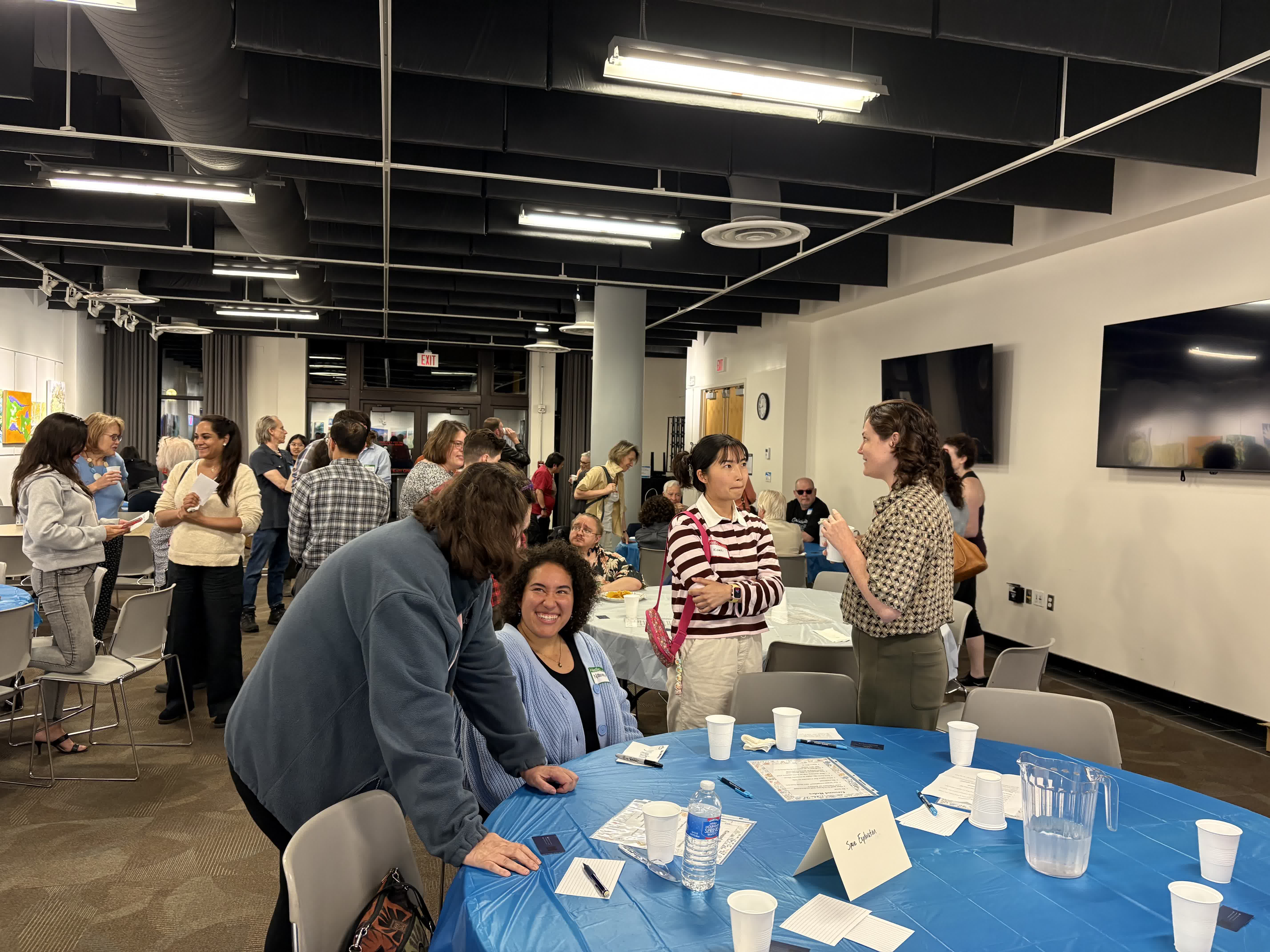 BreadBreakers community gathering around tables